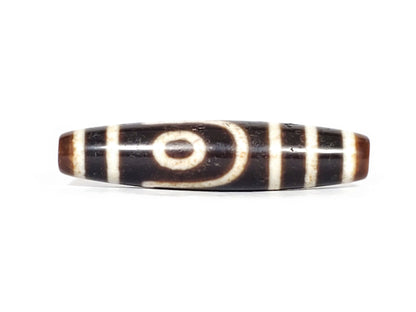 V-070426-2E3 dzi bead, front view showing stepped-line face, brown-black agate, unretouched.