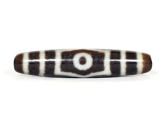 V-070226-ThE-001 vintage three eye dzi bead, front view, single eye with shield border, 56.4×12.1mm, unretouched.