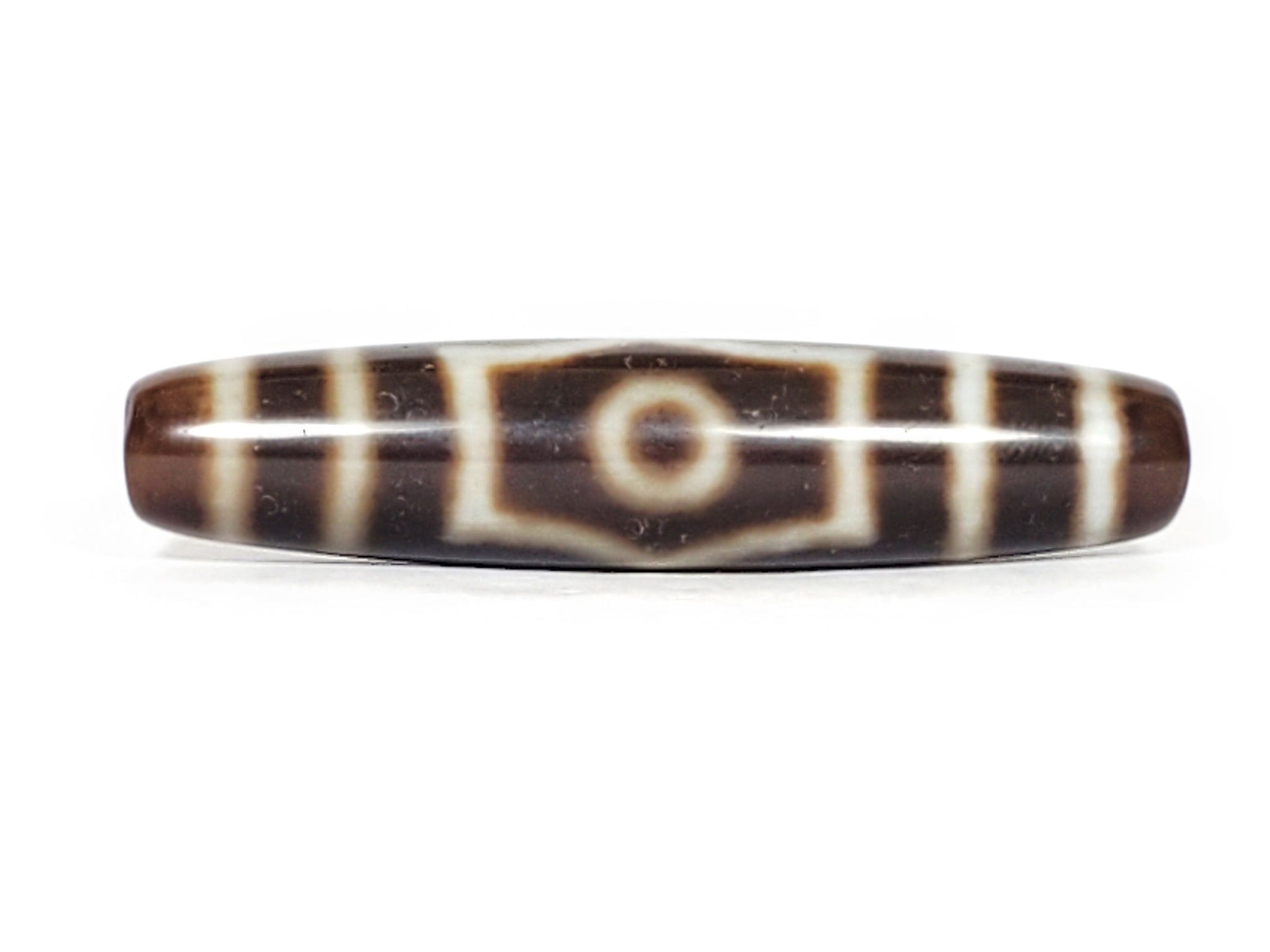 V-070226-ThE-003 vintage three eye dzi bead, front view, single eye with shield border, dark brown, 56.2×12.4mm, unretouched.