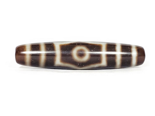 V-070226-ThE-003 vintage three eye dzi bead, front view, single eye with shield border, dark brown, 56.2×12.4mm, unretouched.