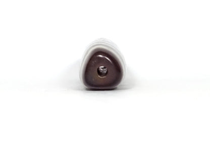 V-070226-3E dzi bead, end view showing triangular cross-section and drill hole, unretouched.