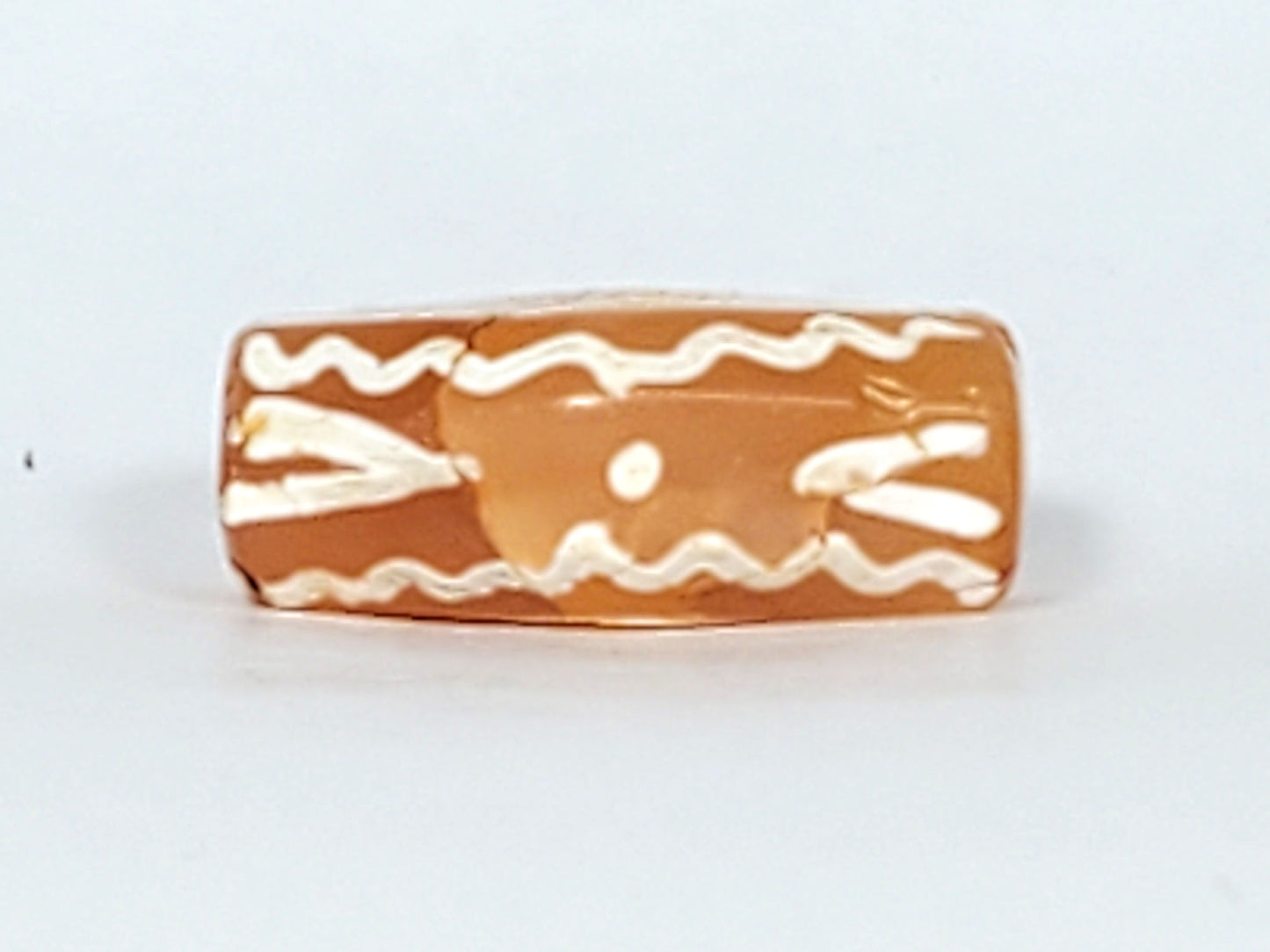 Ac-030623-DDIE carnelian dzi long face, star dot, tiger tooth chevrons, wave border, terracotta-orange, unretouched