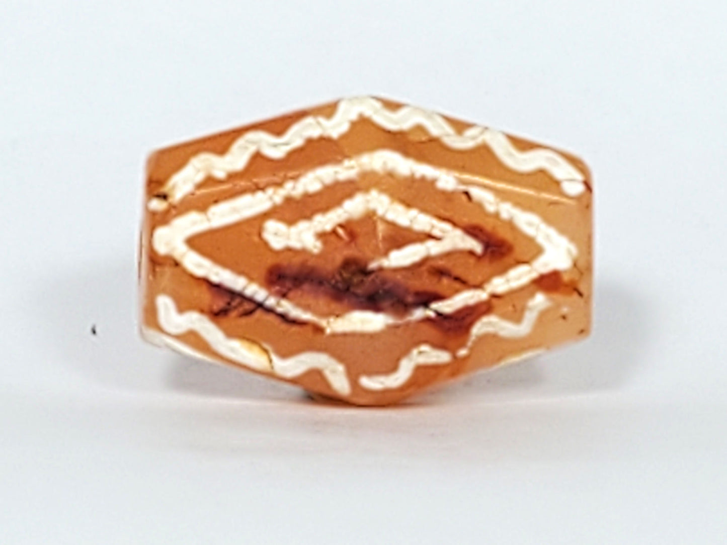 Ac-030623-DDIE carnelian dzi second angular face, two-ring diamond eye, age crack visible, unretouched