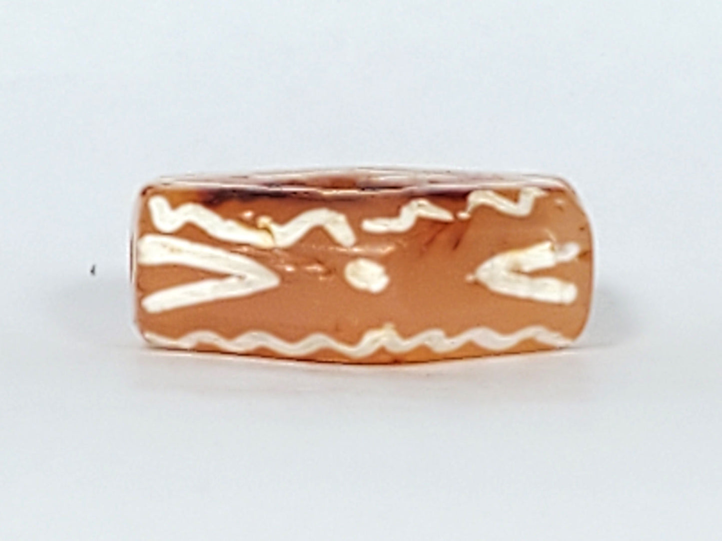 Ac-030623-DDIE carnelian dzi second long face, tiger tooth chevrons and star dot, wave lines, unretouched