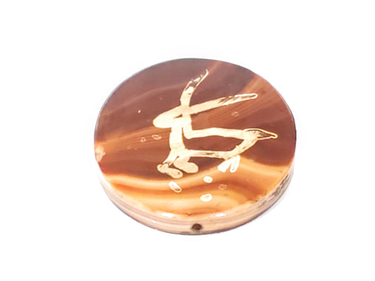 At-062926-DD Face A, single deer figure leaping pose, warm reddish-brown carnelian disc 38.2×5.8mm, unretouched