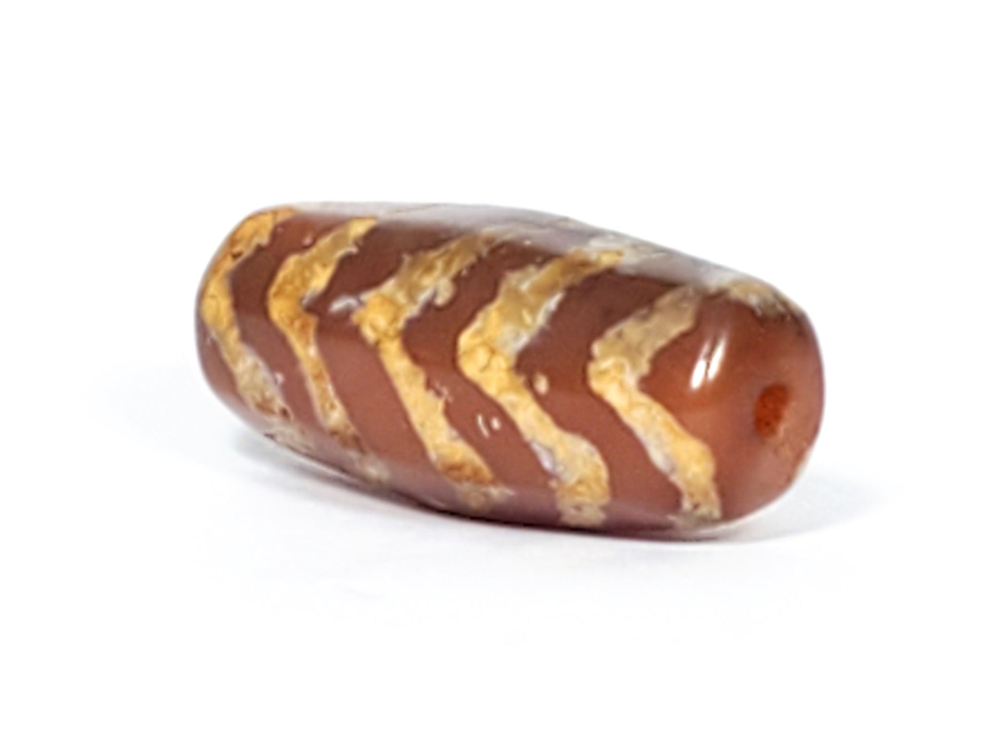 At-030823-5TSR opposite end, drill hole, honey-gold stripes on chocolate-brown carnelian, rounded barrel, unretouched
