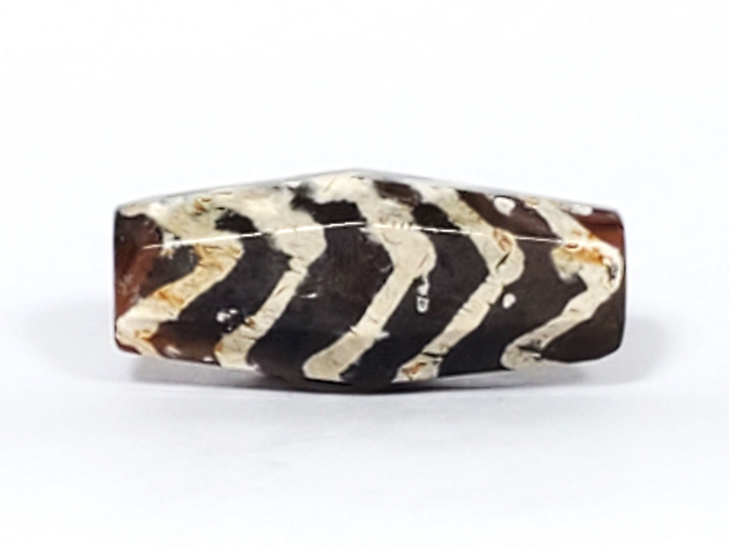 Ac-030823-5TS2 lateral face, bright white chevron lines on chocolate-brown carnelian, surface crack visible, unretouched