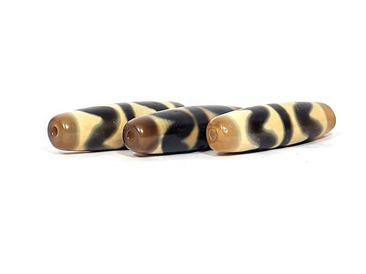 N-062626-3DWSET set three new double wave dzi, end cap view, honey-brown ends, drill holes visible, unretouched