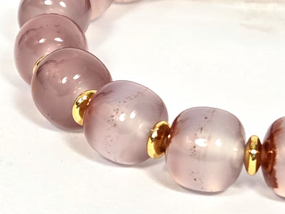 N-020726-CB3 arc detail, near-translucent blush-lavender chalcedony beads, gold spacers, minor cinnabar, unretouched