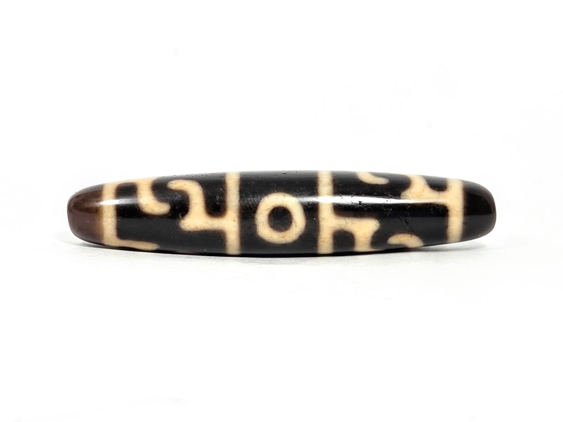 At-070826-GRRP3E antique Guru Rinpoche paraphernalia three eye dzi dark brown agate second face rotated view unretouched
