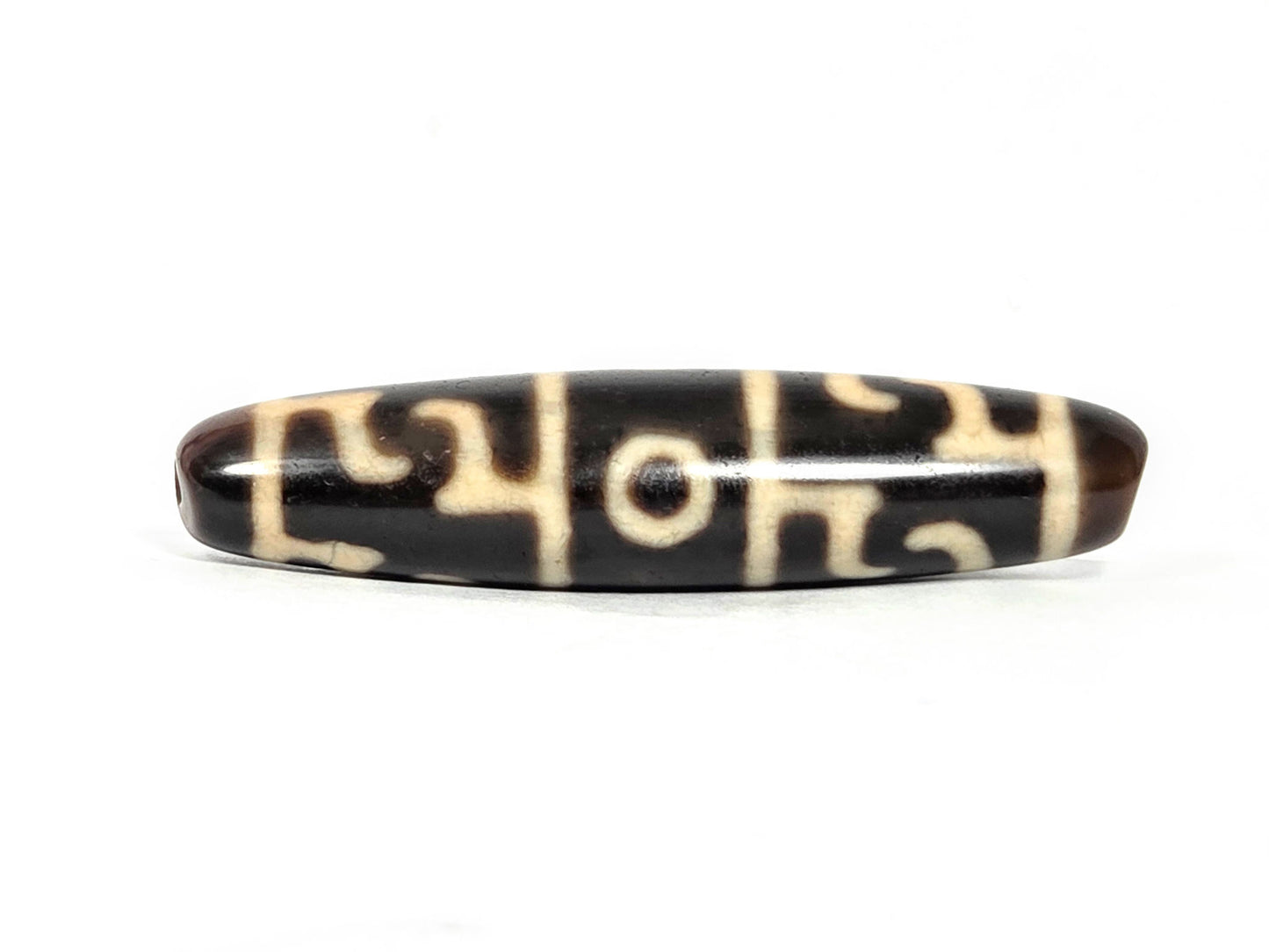 At-070826-GRRP3E antique Guru Rinpoche paraphernalia three eye dzi dark brown agate third face drill end visible unretouched