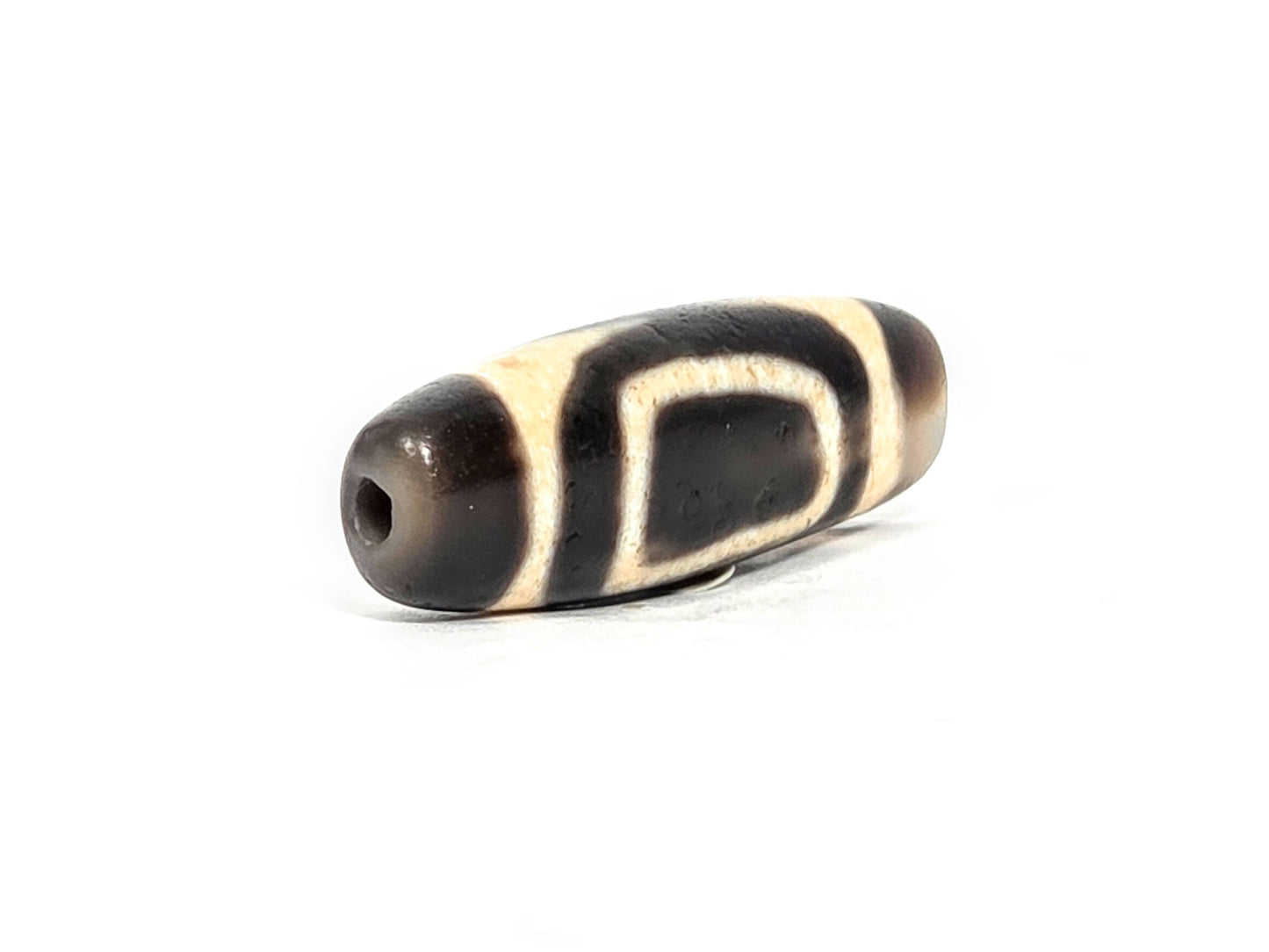 V-071326-HE dark brown-black end cap, second drill hole, ground colour continues to tip, 1980s Taiwan, unretouched