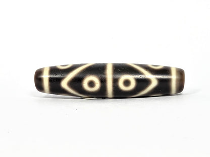 At-080226-8E2 antique eight eye dzi dark brown agate face C two almond-frame eye pair vertical divider unretouched
