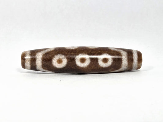 N-083126-10E new ten eye dzi bead 58.3x13.4mm warm brown agate matte front face unretouched