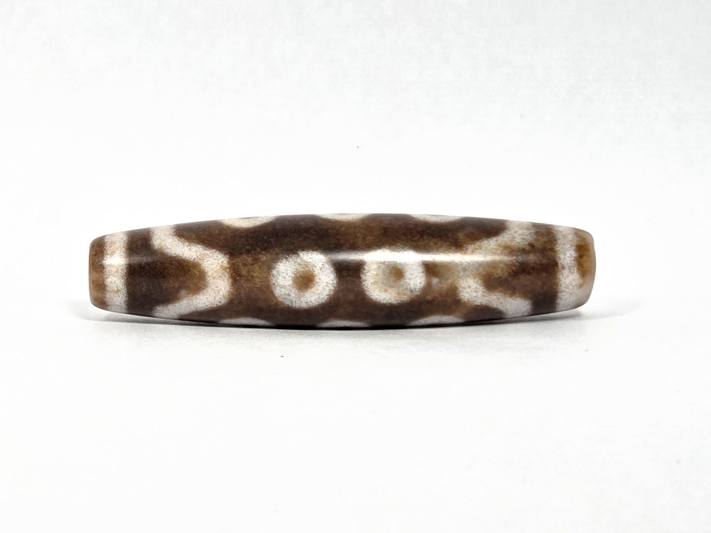 N-083126-10E new ten eye dzi bead warm brown matte 90-degree rotation wave connector lines unretouched