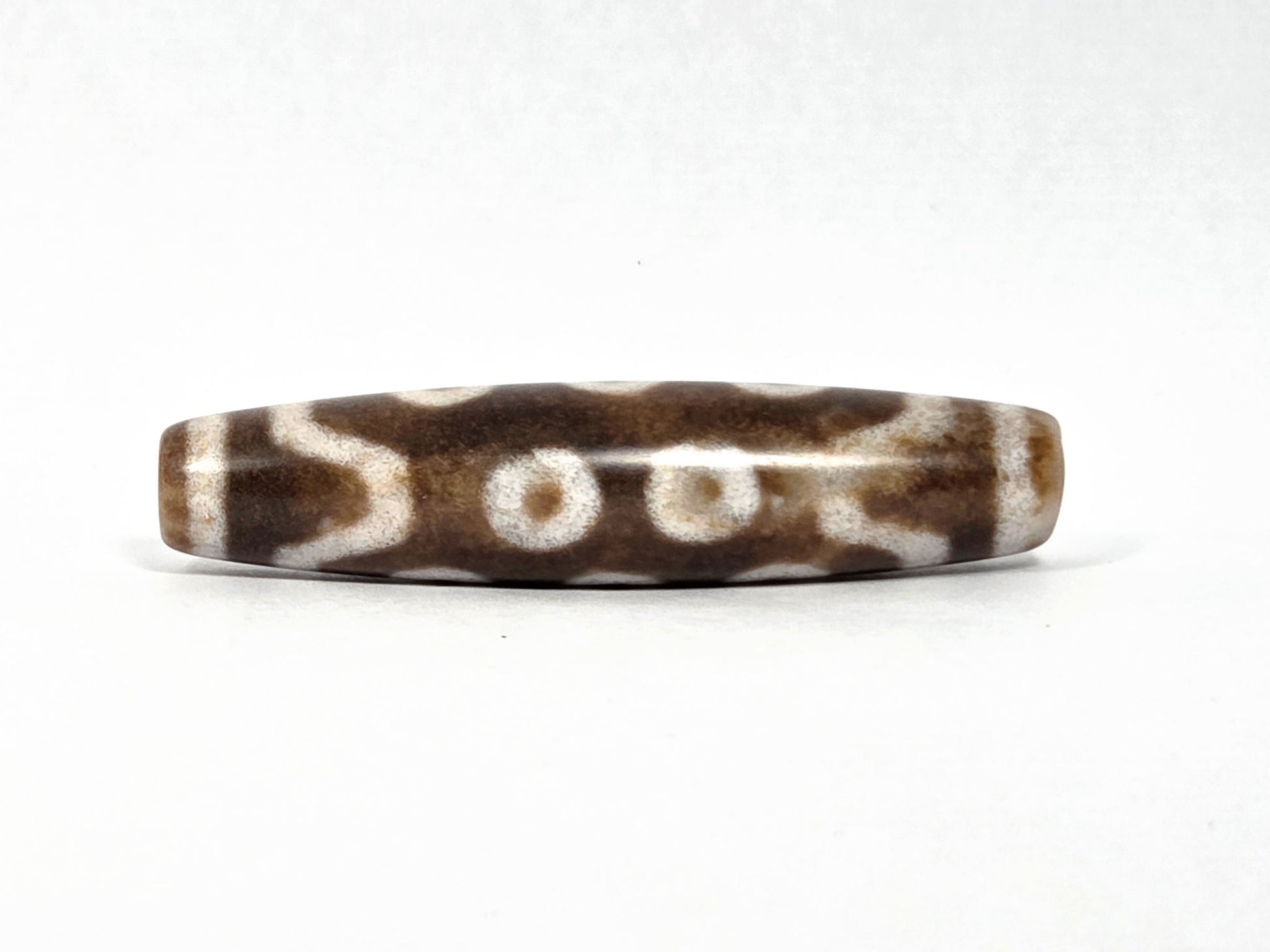 N-083126-10E new ten eye dzi bead warm brown matte 90-degree rotation wave connector lines unretouched