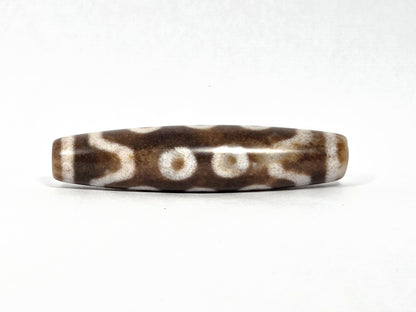 N-083126-10E new ten eye dzi bead warm brown matte 90-degree rotation wave connector lines unretouched