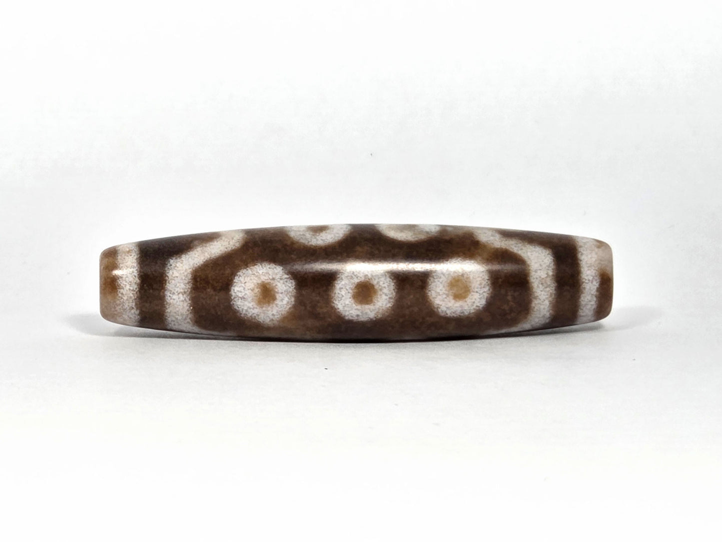 N-083126-10E new ten eye dzi bead warm brown agate underside rotation full eye row unretouched