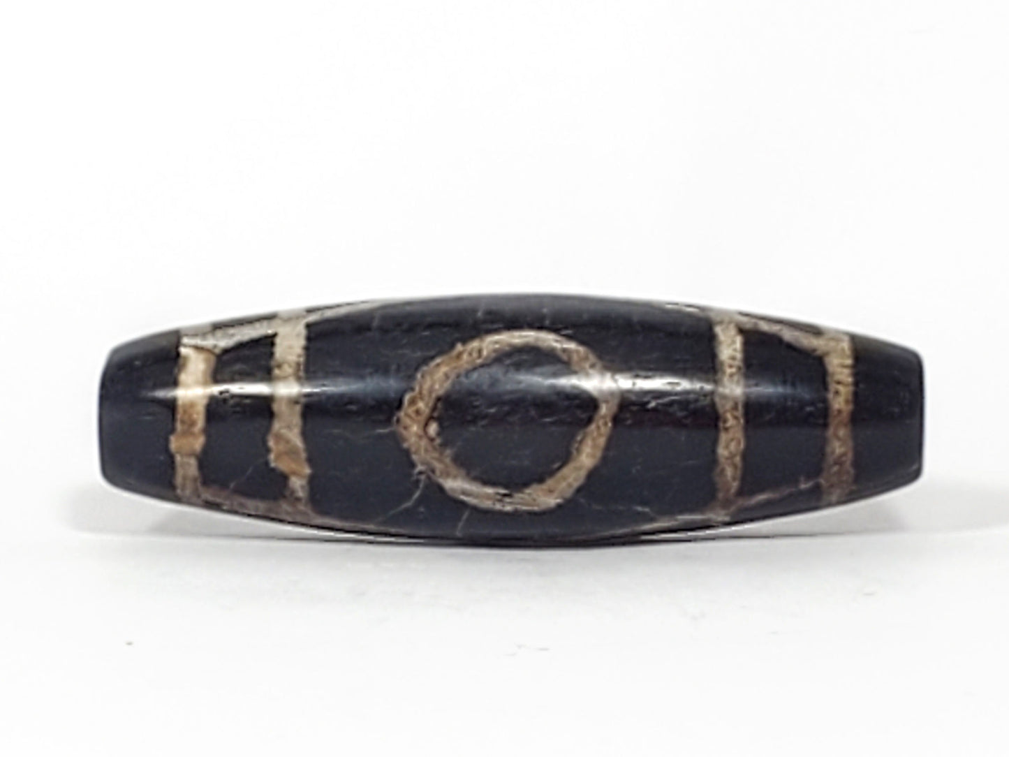 Ac-070926-TWE ancient two eye dzi pitch-black agate third face one eye visible calcified motif lines unretouched