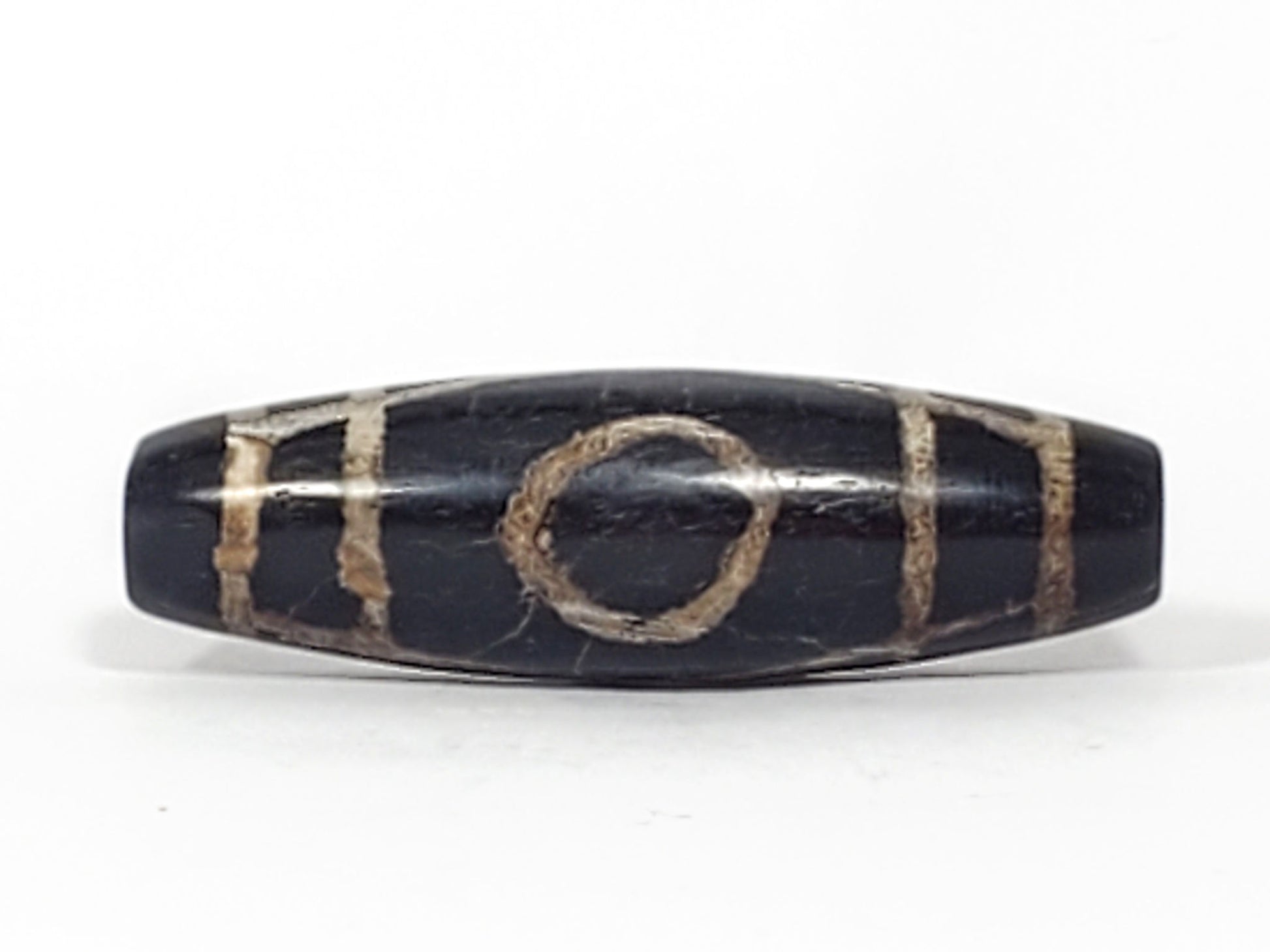 Ac-070926-TWE ancient two eye dzi pitch-black agate third face one eye visible calcified motif lines unretouched