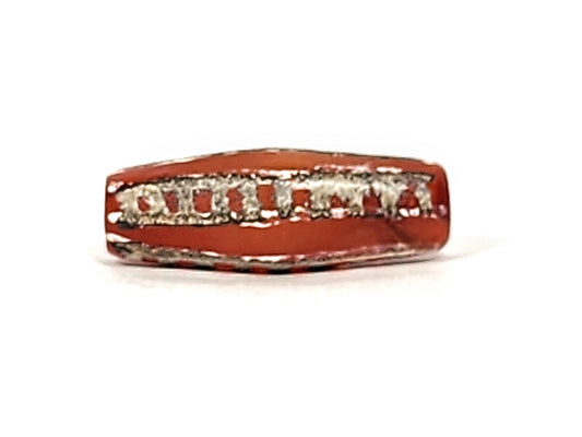 Ac-010825-4RT face B, octagonal body form visible, terracotta-red carnelian, rail track motif, dark end trim, unretouched