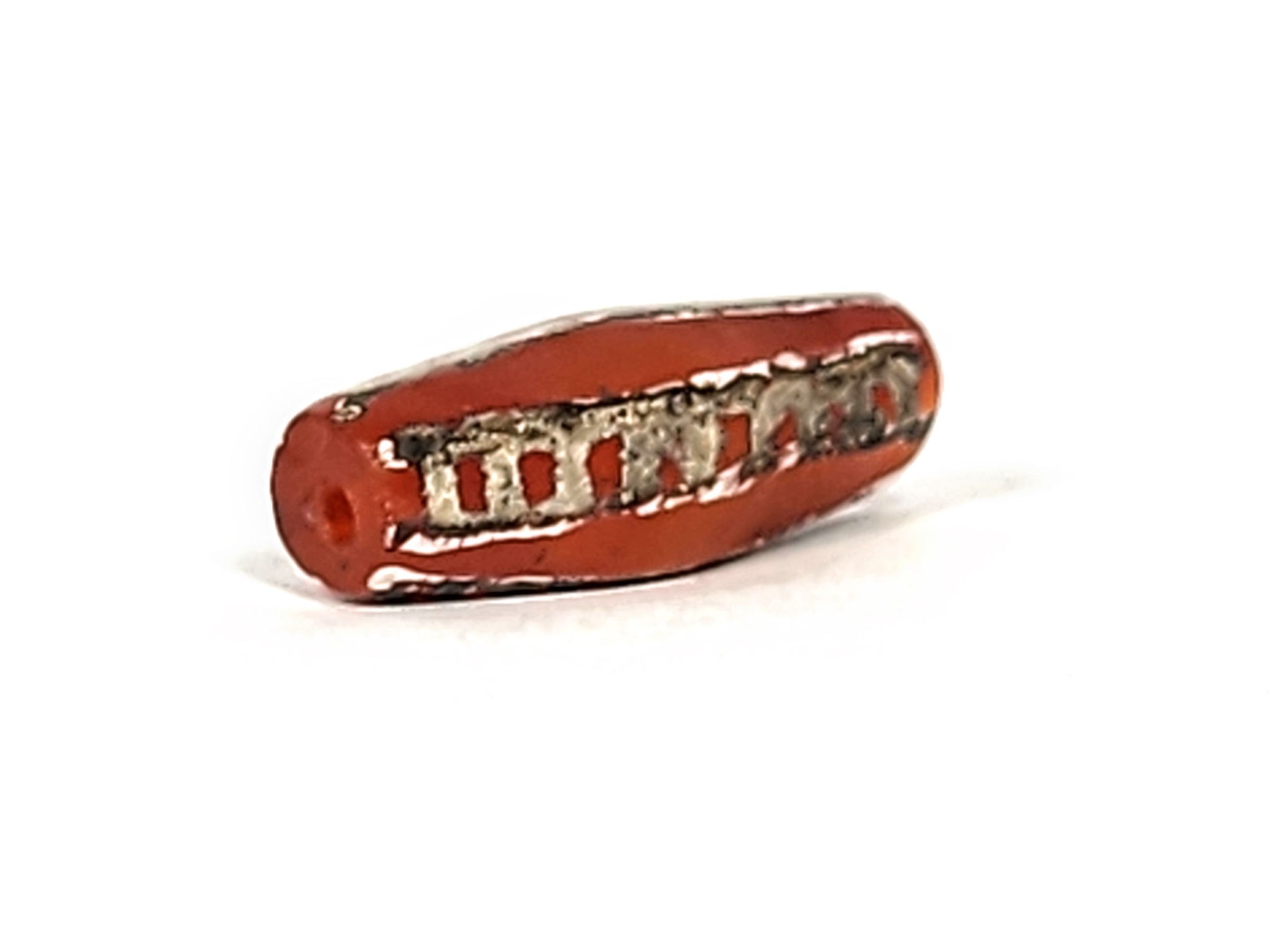 Ac-010825-4RT opposite end angled, drill hole centred, dark border trim, terracotta carnelian body, rail motif, unretouched
