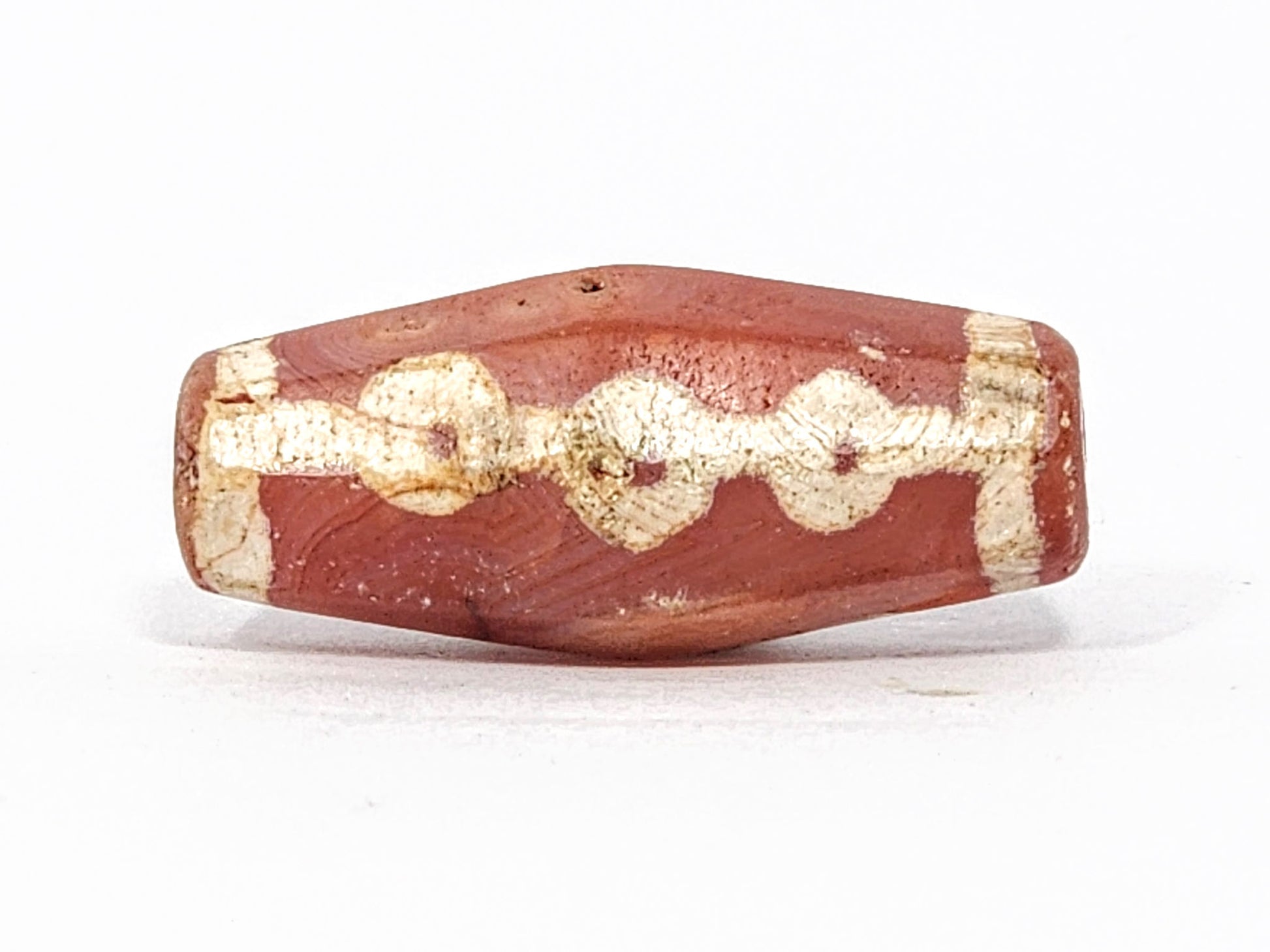 Ac-050725-LKBS hero face A, 25.7×11.2mm terracotta-red carnelian, gold-tan chain links, stripe terminators, unretouched