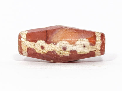 Ac-050725-LKBS face B, octagonal facets visible, orange carnelian banding, links motif, surface crack, unretouched