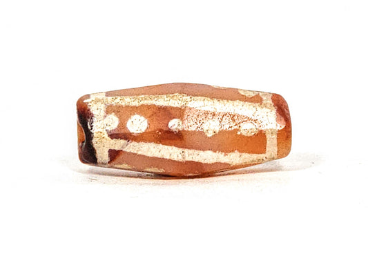 Ac-030625-20S face A hero, 22.8×10.0mm orange-brown carnelian, star dots in framed band, dark end zone, unretouched