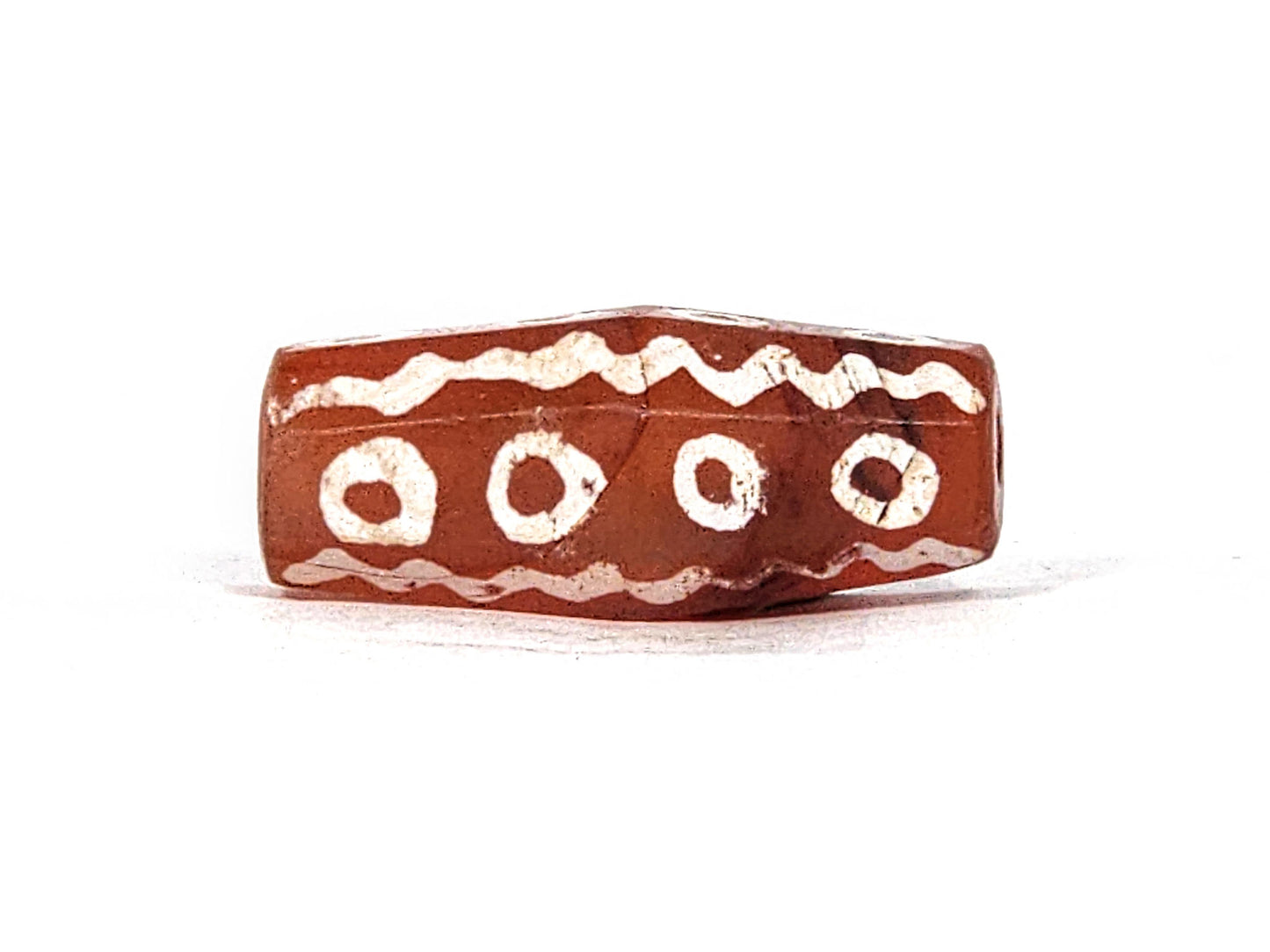 Ac-010825-16EW face D, wave band wear visible, 4 ring eyes, octagonal flat face, matte terracotta carnelian, unretouched
