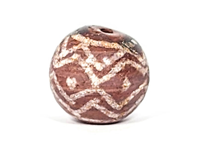 Ac-122224-TSS face C, star asterisk crossing motif centre zone, tiger stripe surround, calcification, unretouched