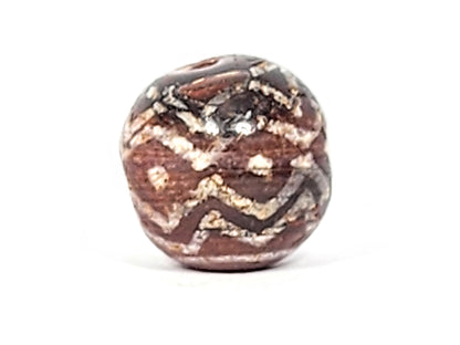 Ac-122224-TSS face D, heaviest calcification zone, tiger stripe partially obscured, reddish-brown carnelian, unretouched