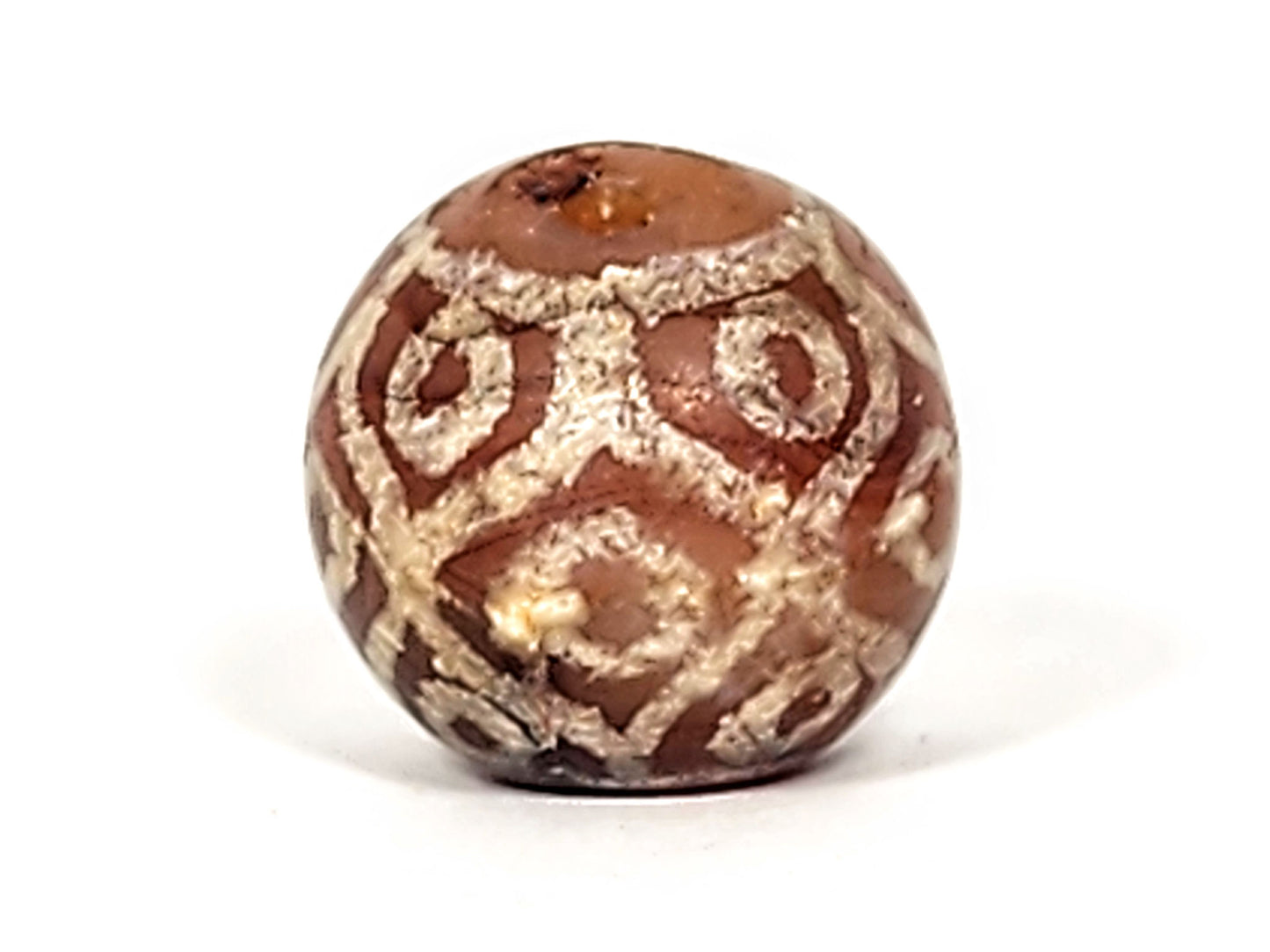 Ac-122924-15EL ancient carnelian dzi third rotation, weathered sandy-cream lotus network on brown-terracotta, unretouched
