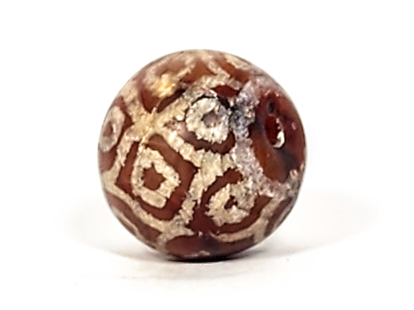 Ac-122924-15EL fifteen eye lotus dzi fourth face, eroded motif lines, warm brown-terracotta carnelian, unretouched