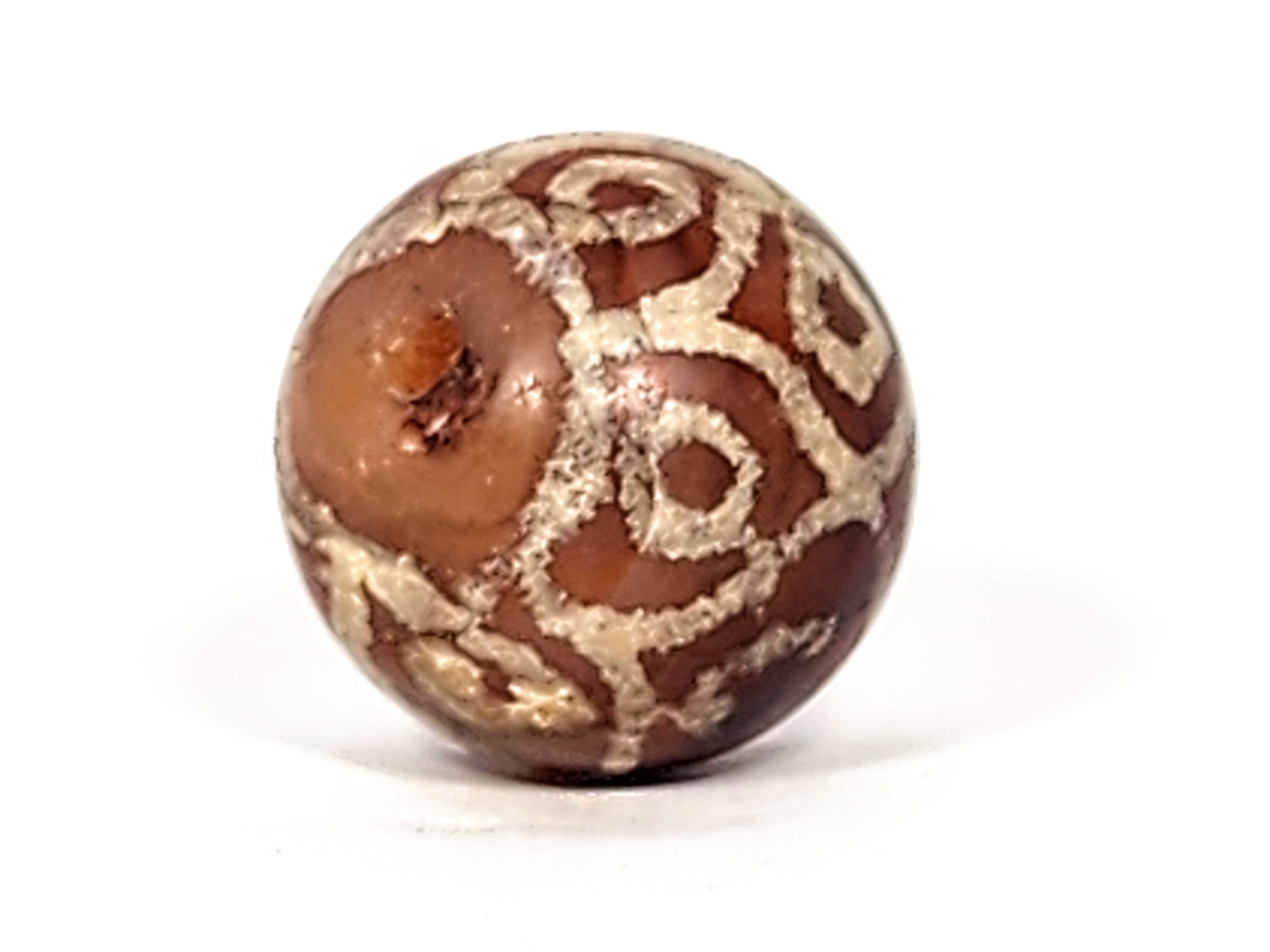 Ac-122924-15EL ancient carnelian dzi drill hole face, wide irregular hand-drilled hole, aged surface, unretouched