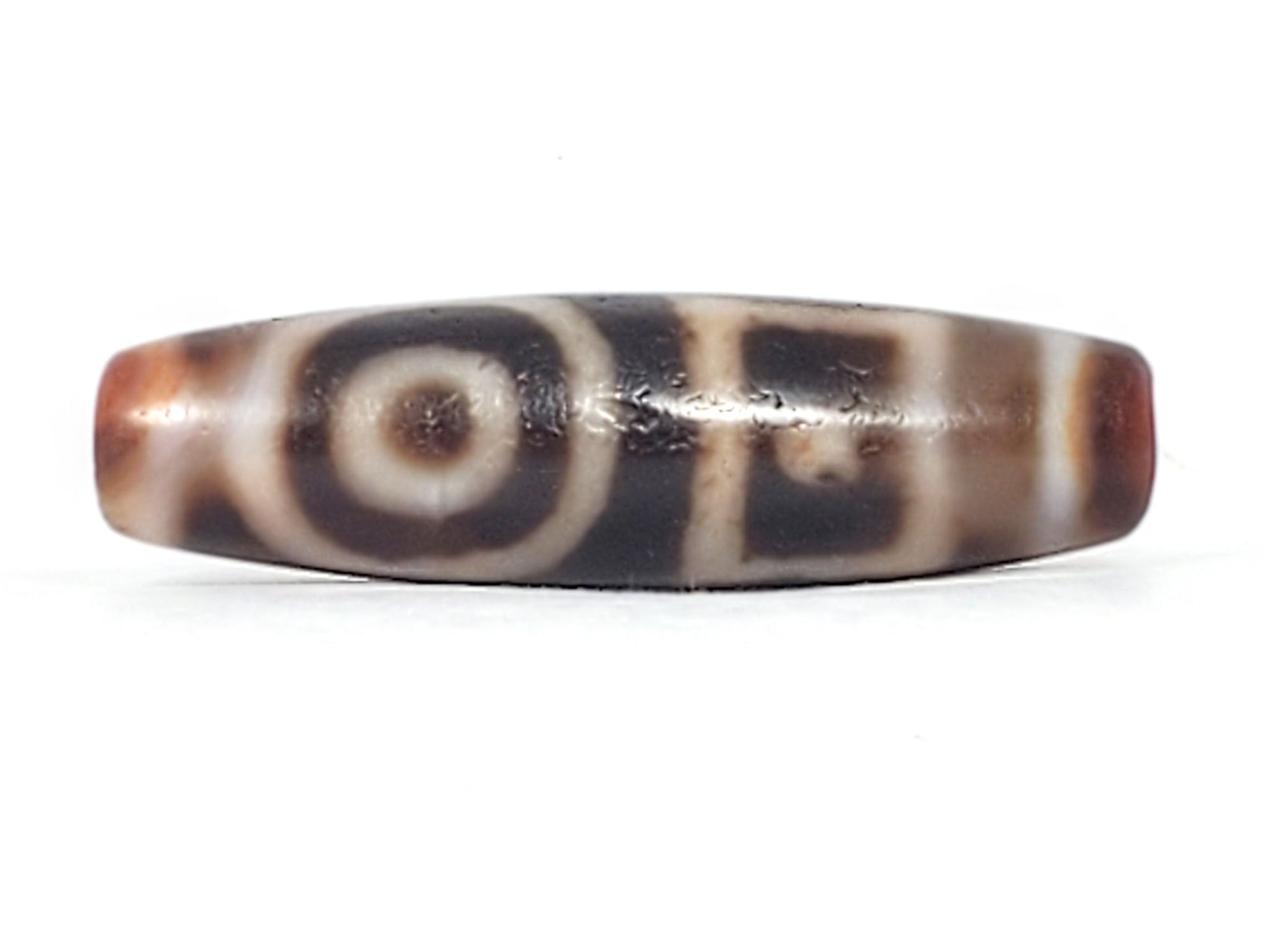 Antique heaven earth gate dzi — Face A, round eye with concentric rings, brown centre spot, warm agate ends, At-0426-DHE