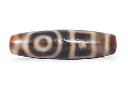 Antique heaven earth gate dzi — Face A, round eye with concentric rings, brown centre spot, warm agate ends, At-0426-DHE