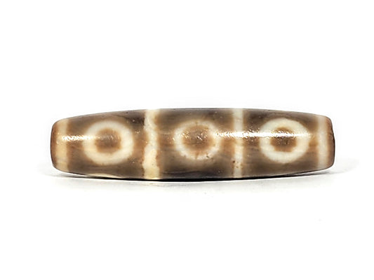 Ac-071026-8E ancient eight eye dzi 51.3x13.0mm warm grey-brown agate face A three eyes in row unretouched