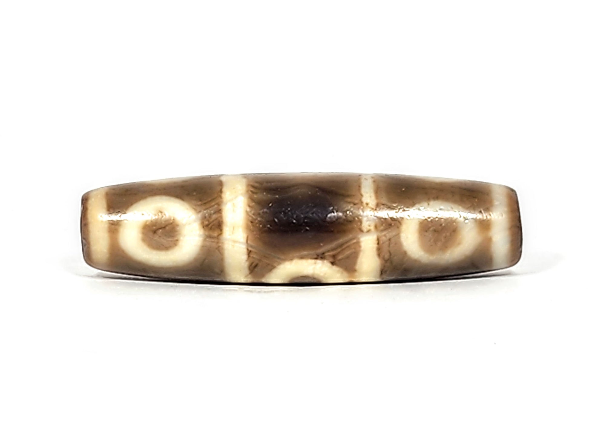 Ac-071026-8E ancient eight eye dzi warm grey-brown agate face B two eyes natural banding zone unretouched