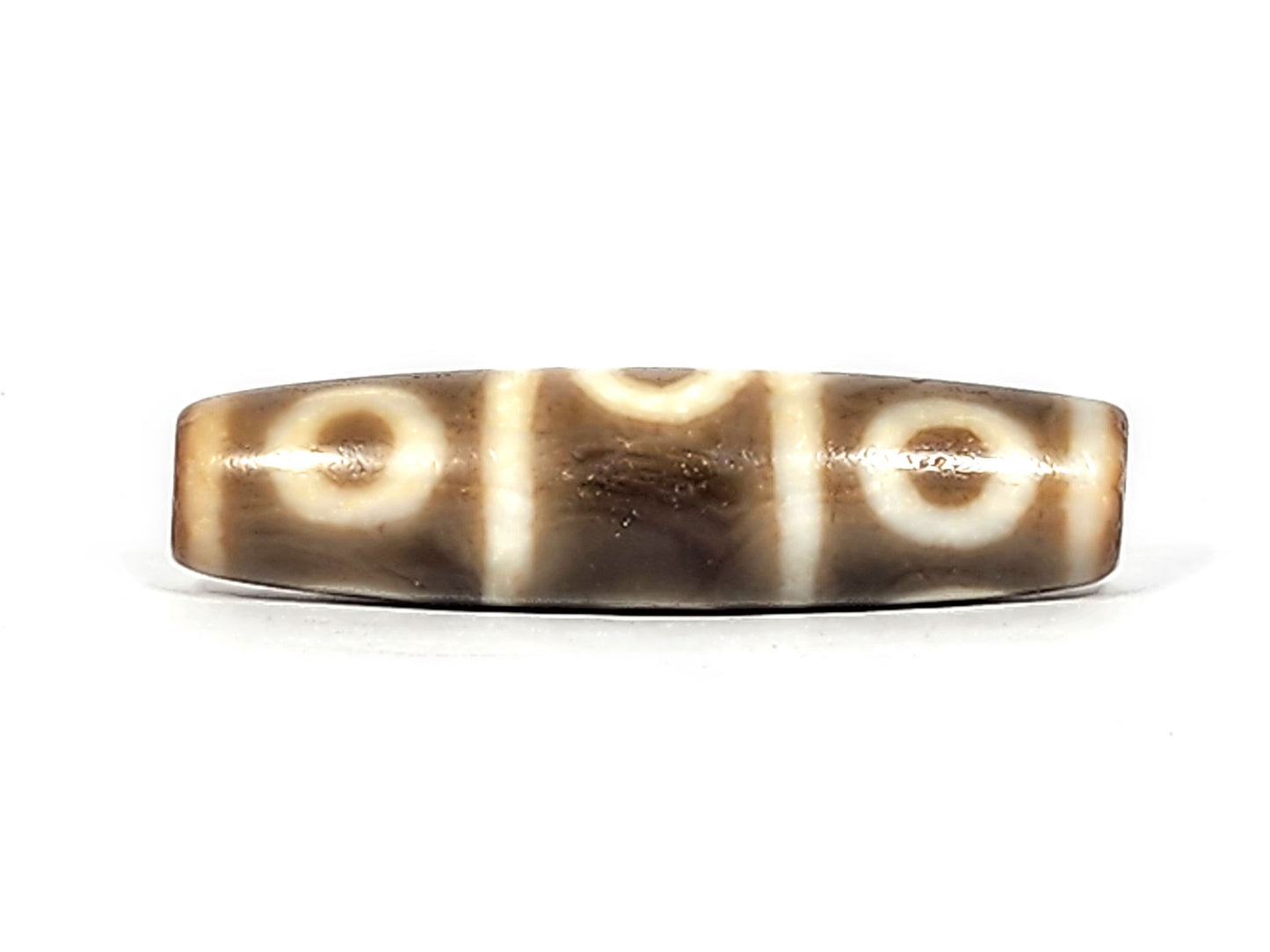 Ac-071026-8E ancient eight eye dzi warm grey-brown agate face D three eyes cooler ground unretouched