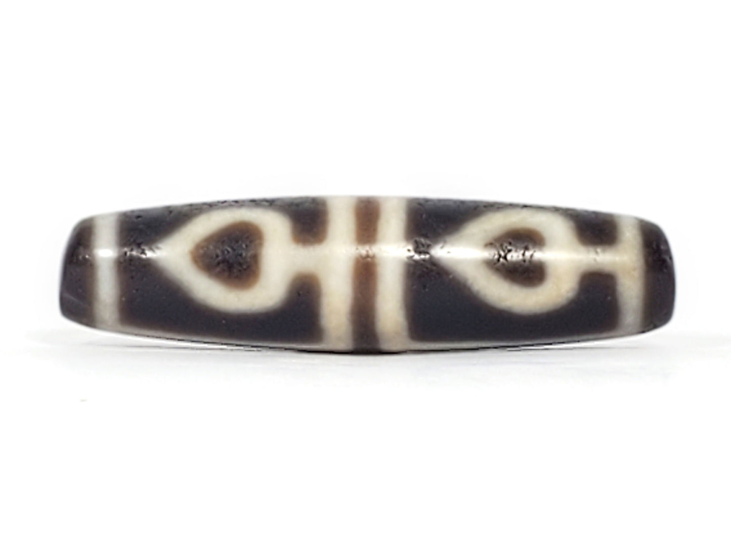 Ac-061826-FLB2 ancient four leaf bodhi dzi 46.9×11.9mm Face A, two bodhi leaves cool dark grey-brown agate, unretouched