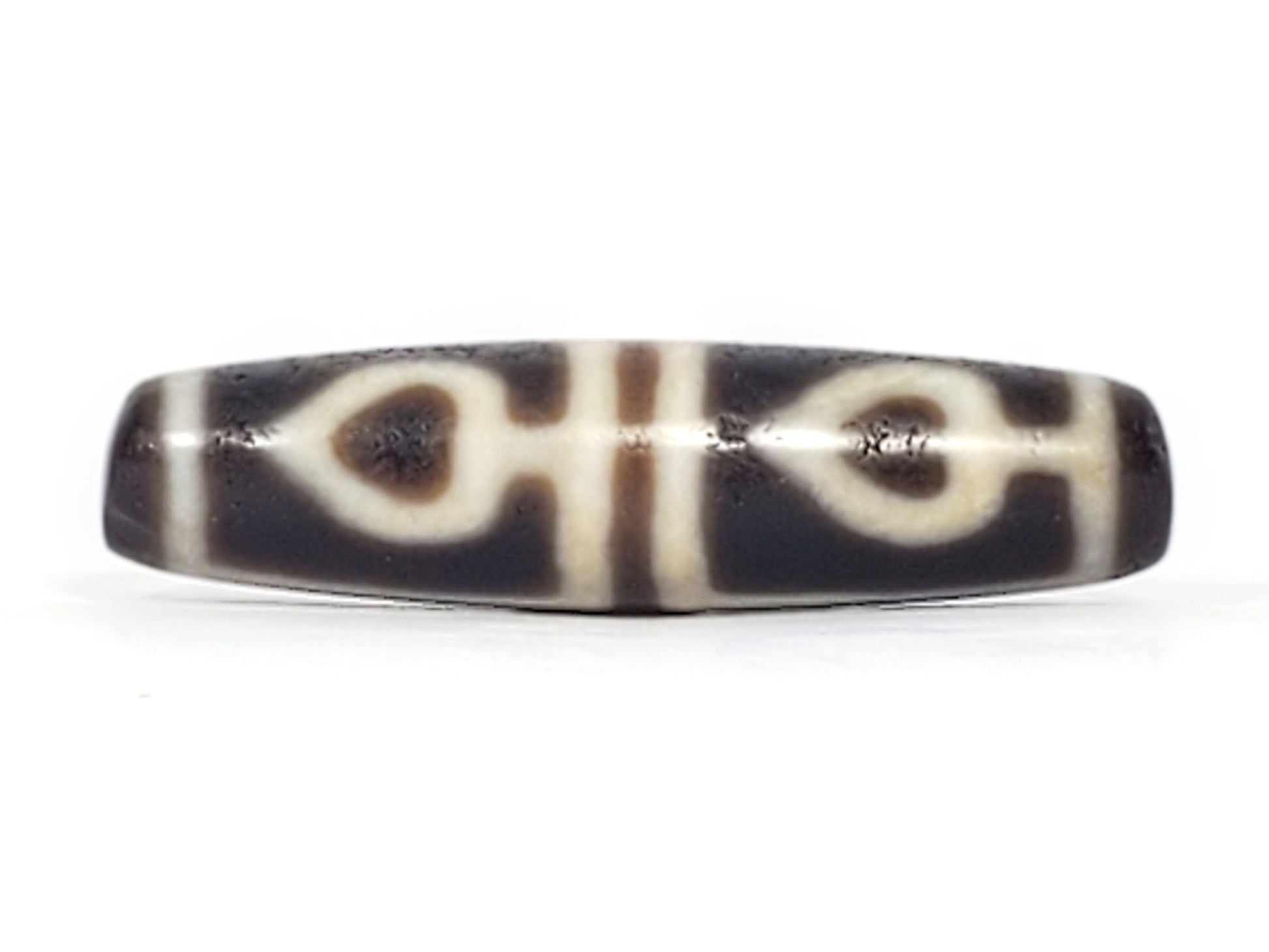 Ac-061826-FLB2 ancient four leaf bodhi dzi 46.9×11.9mm Face A, two bodhi leaves cool dark grey-brown agate, unretouched