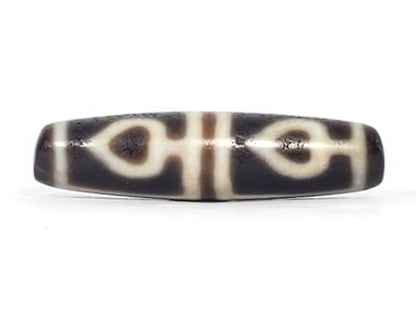Ac-061826-FLB2 ancient four leaf bodhi dzi 46.9×11.9mm Face A, two bodhi leaves cool dark grey-brown agate, unretouched