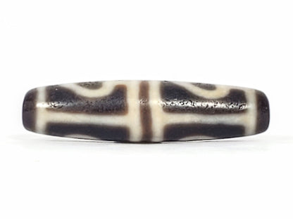 Ac-061826-FLB2 upper connector face, T-bar cream-white bands, matte granular weathered dark ground disclosed, unretouched