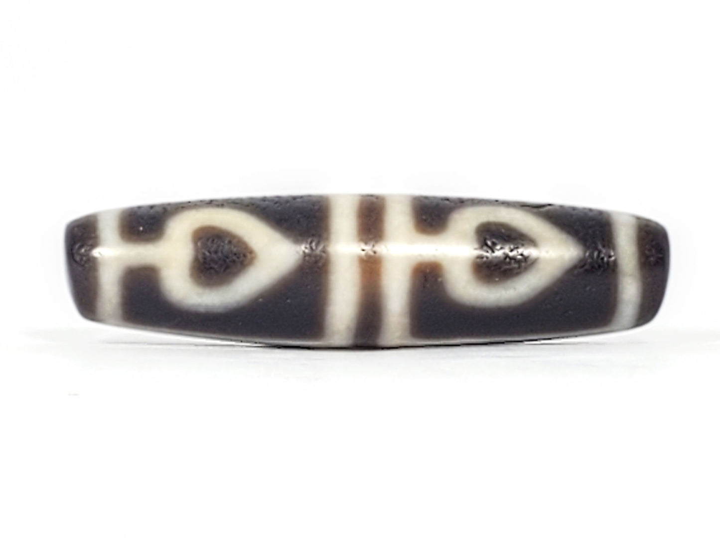 Ac-061826-FLB2 Face B, two bodhi leaf forms with honey-brown interiors, cream-white divider stripe, unretouched