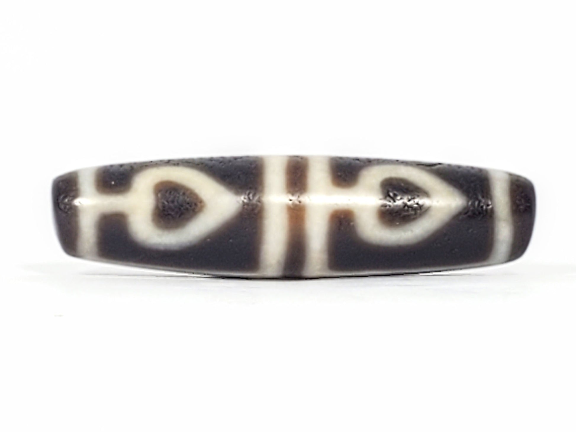 Ac-061826-FLB2 Face B, two bodhi leaf forms with honey-brown interiors, cream-white divider stripe, unretouched