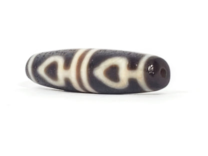 Ac-061826-FLB2 right drill hole end, warm reddish-brown interior, bodhi leaf forms wrapping body, unretouched