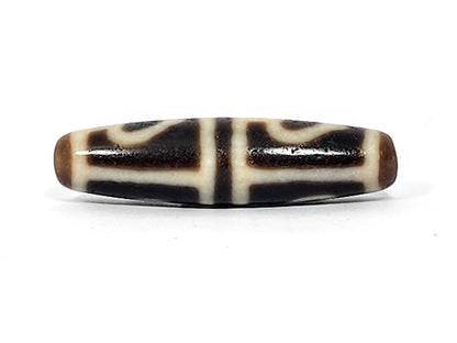 Ac-070625-FLB3 connector face, cream-dominant field with dark T-bar grid cross, honey-brown end cap visible, unretouched