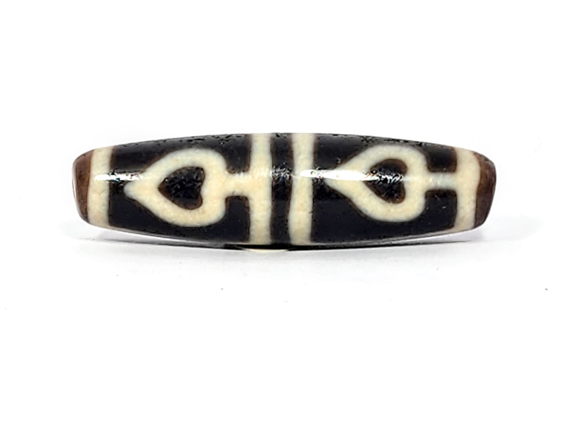 Ac-070625-FLB3 Face B, two bodhi leaf forms with honey-brown interiors on pitch-black ground, unretouched