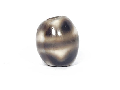Ac-021724-TT ancient round tiger tooth dzi, fourth face, lower tooth zone visible, unretouched